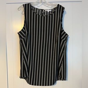Black and white sleeveless blouse